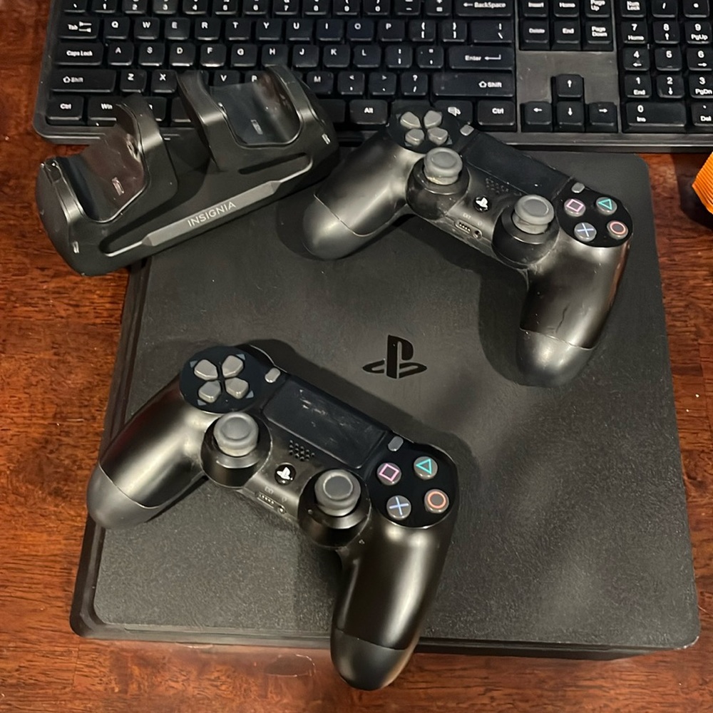 Ps4 slim with controllers and controller dock